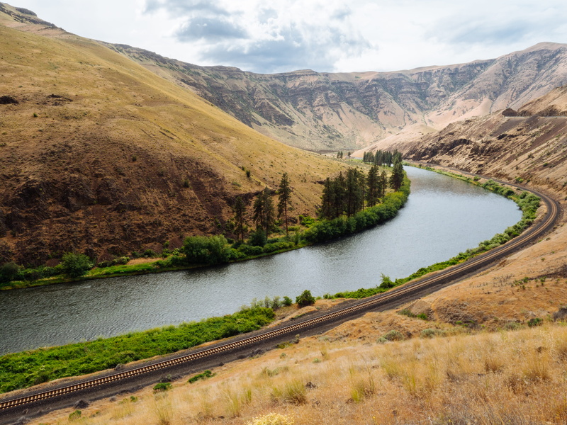 remote, mountains, plant, ridge, water, lake, track, no people, train tracks, beauty in nature, cloud - sky, railroad, tranquility, environment, landscape