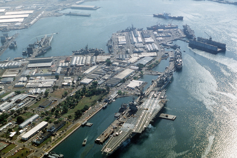 aerial view, harbor, military, no people, sea, aircraft carrier, outdoors, freight transportation, transportation, cityscape, black, business, ship, water