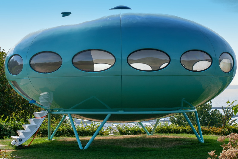 built structure, 2K, day, grass, design, saucer, aerospace industry, mode of transportation, field, clear sky, airplane, no people, futuro, turquoise colored