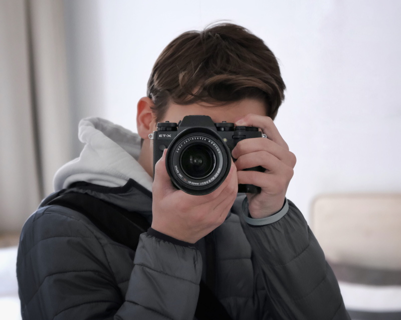 photography, strap, austria, one person, digital camera, lens - optical instrument, holding, occupation, jacket, fuji x-t3, mirror, human, photographer