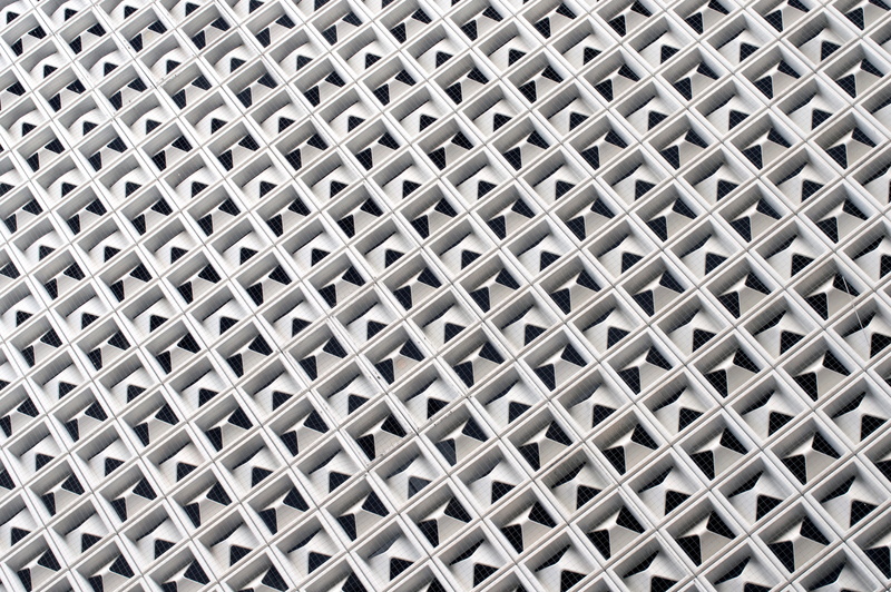 silver colored, architecture, bed, geometric shape, shape, steel, repetition, architectural feature, no people, patter, indoors, design, crisscross, alloy