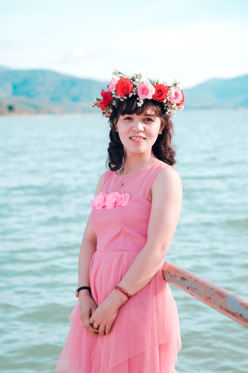 women, wearing, outdoors, hairstyle, water, fashion, horizon, sea, 5K, flower, real people, ocean, dress, standing, woman, lifestyles, nature, waves, portrait