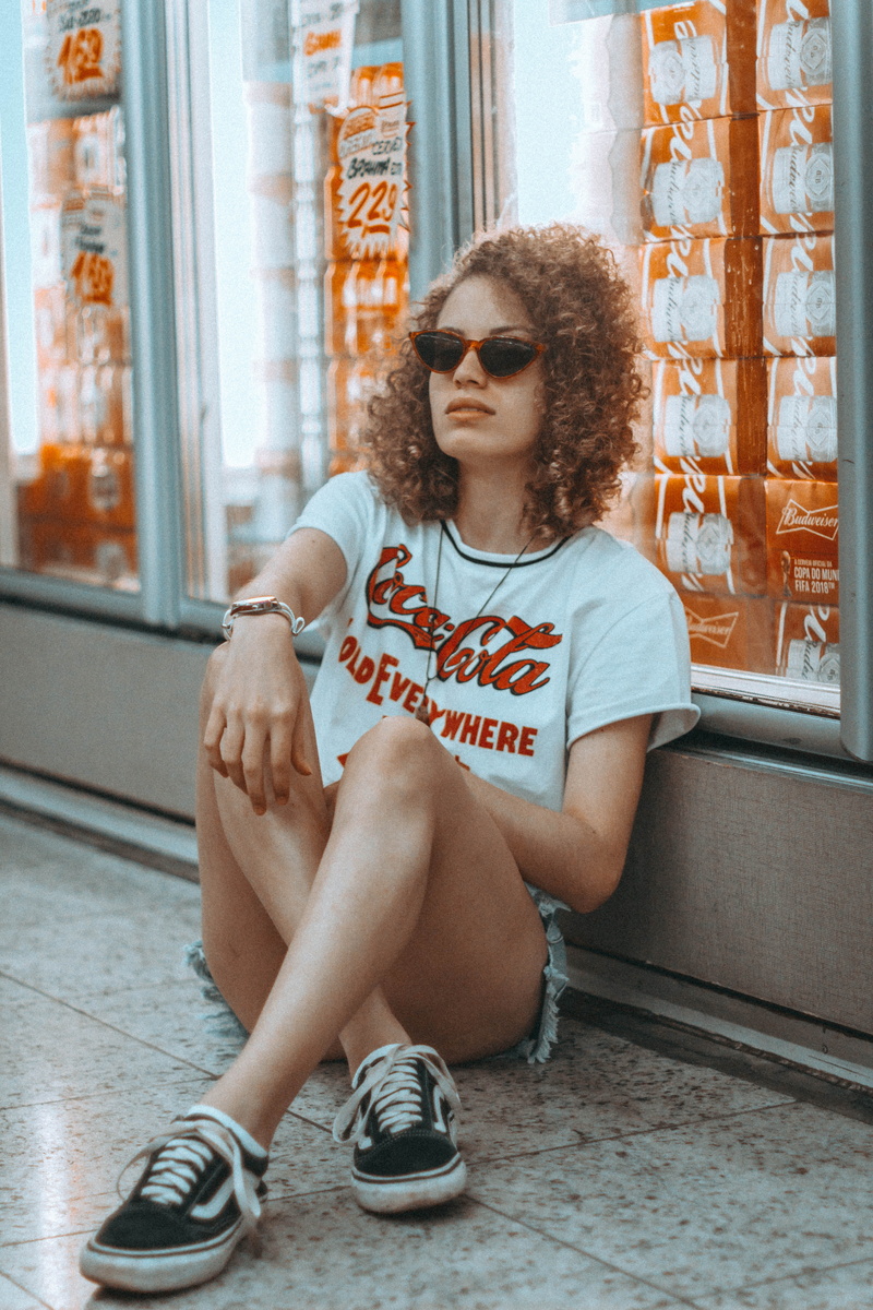 african Descent, denim wear, female, indoors, glass, floor, t-shirt design, looking, fashion, outdoors, african Ethnicity, urban, supermarket, uSA, urban Scene
