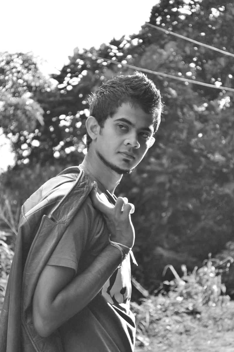 fashion, 1080P, looking at camera, teenage boys, day, contemplation, side view, pose, t-shirt, man, real people, photos, lifestyles, ceylon, tree, rock