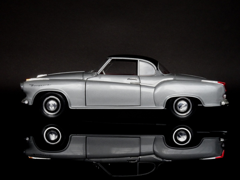 profile view, black background, model car, model, elegant, sports car, collectors car, indoors, vintage car, studio shot, single object, car, 5K, dream car