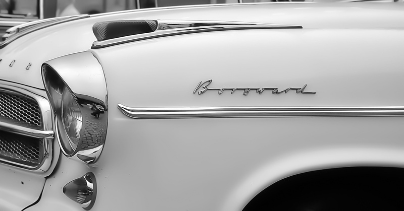 auto detail, focus on foreground, retro styled, classic, chrome, luxury, auto, nostalgia, bumper, metal, 2K, mode of transportation, elegant, day, 1950s
