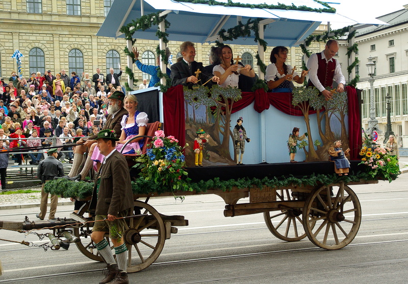 road, large group of people, architecture, built structure, real people, building exterior, cart, char, transportation, women, horse cart, munich, city