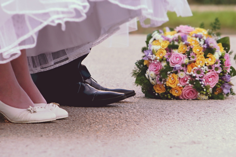 people, low section, event, plant, shoes, bouquet, in conjunction with the, wife, woman, ceremony, contact, adult, real people, women, celebration, husband