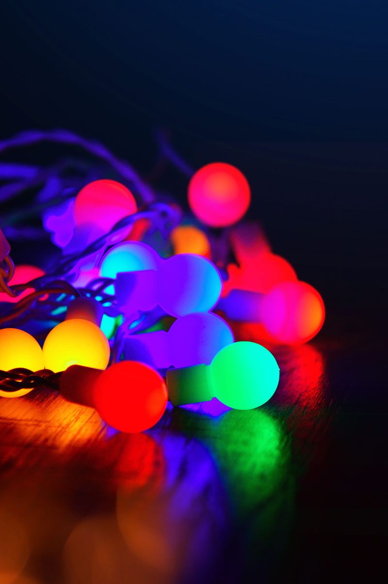 round out, indoors, motion, colorful, string lights, assorted, color, bulbs, blur, light - natural phenomenon, colors, design, string, red, dark, illuminated