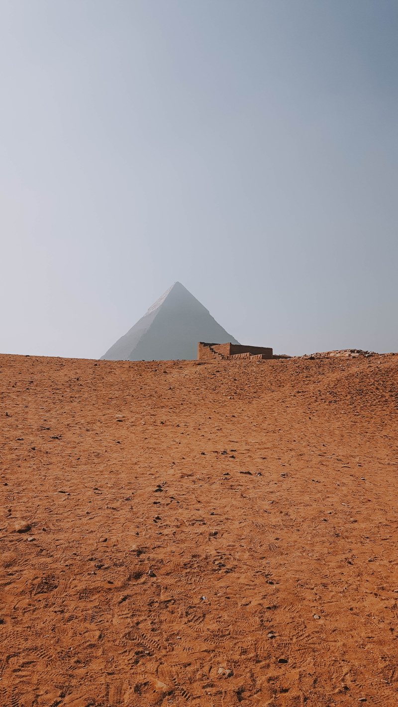 climate, beauty in nature, triangle, grassland, flare, outdoors, travel, bunker, non-urban scene, remote, copy space, desert, field, tranquil scene, nature