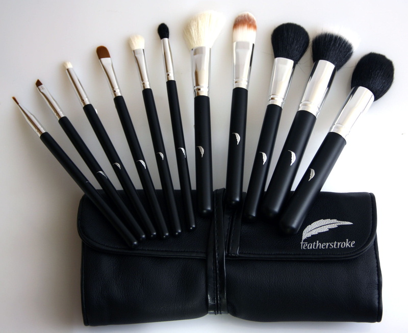 silver colored, cosmetic, side by side, female, beautiful, black, collection, style, wooden, table, still life, indoors, makeup brushes, large group of objects