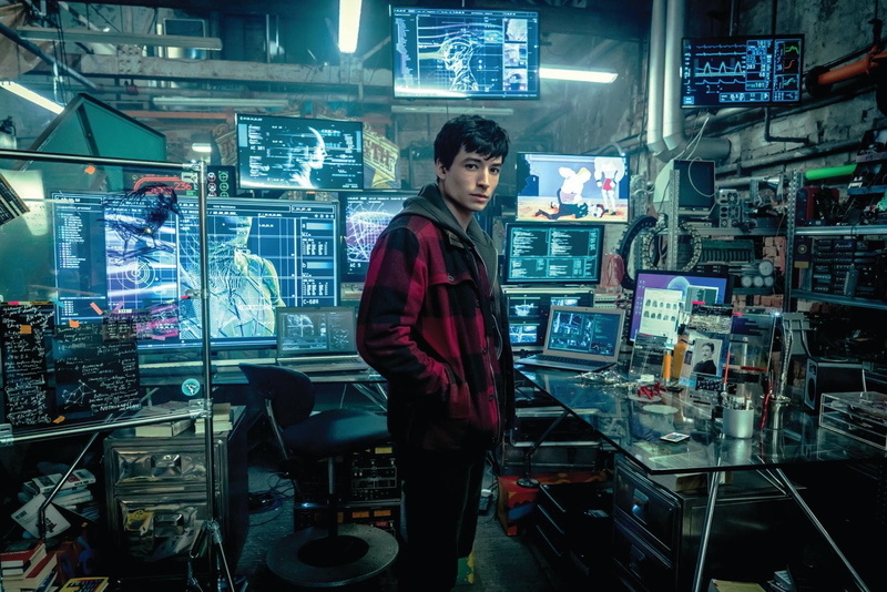 casual clothing, three quarter length, technology, confidence, Movie, store, side view, standing, young adult, looking at camera, occupation, Ezra Miller
