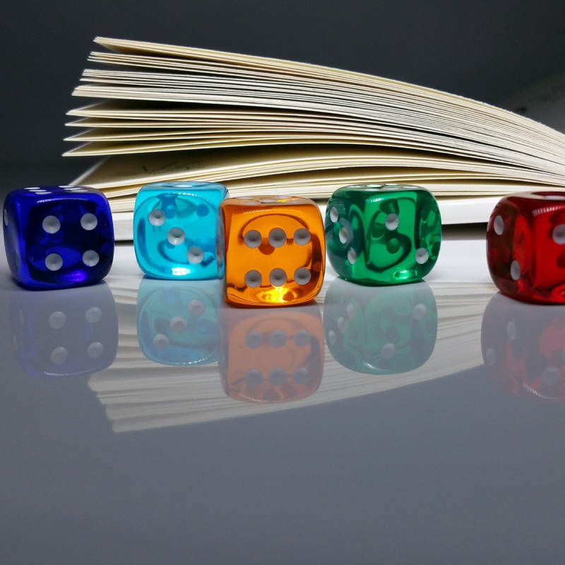toy, multi colored, no people, group of objects, reflection, leisure games, lucky dice, 2K, relaxation, cube, table, colorful, assorted, near, variation