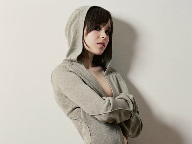 looking at camera, studio shot, portrait, wall - building feature, women ellen page, hood - clothing, beautiful woman, hairstyle, white background, women