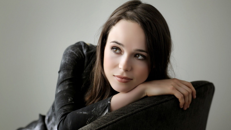looking at camera, ellen page, headshot, beauty, leather, indoors, hair, body part, brown hair, long hair, 1080P, teenager, portrait, front view, contemplation