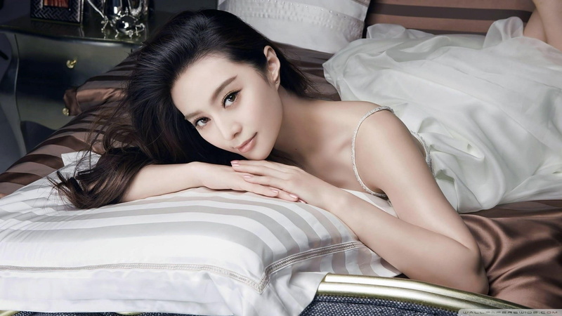 beauty, young adult, furniture, bed, 1080P, Asian, real people, lifestyles, hair, lying down, beautiful woman, bedroom, looking at camera, portrait, indoors
