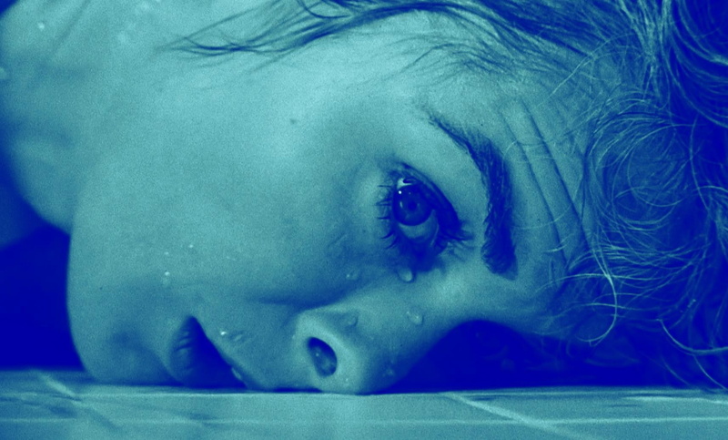 720P, indoors, human face, lifestyles, portrait, one person, mouth open, real people, Alfred Hitchcock, human body part, men, body part, headshot, blue