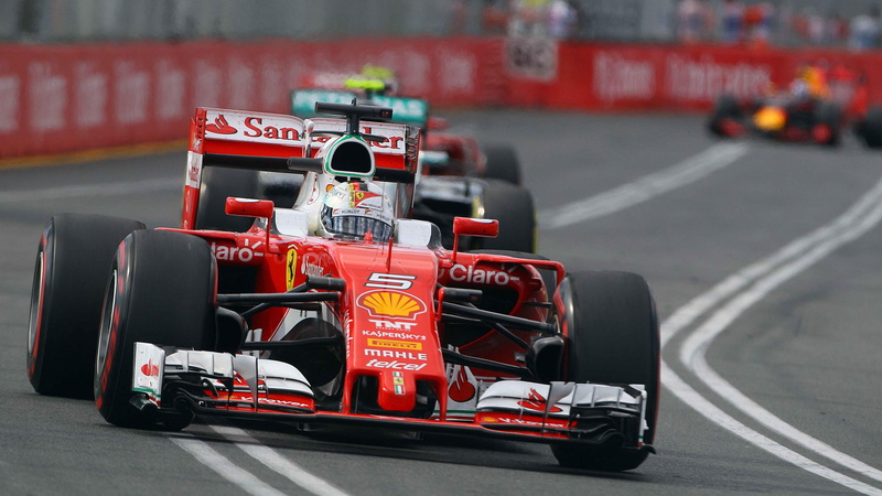 mode of transportation, motor vehicle, red, auto racing, wheel, motorsport, driving, tire, formula one racing, formula one, racecar, sign, ferrari, motor racing track