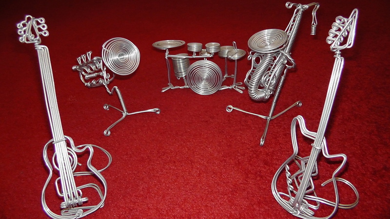 red, instrument, bass, connection, trumpet, music, figures, close-up, statuettes, drums, stainless, grey, studio shot, carpet, abundance, craft, technology