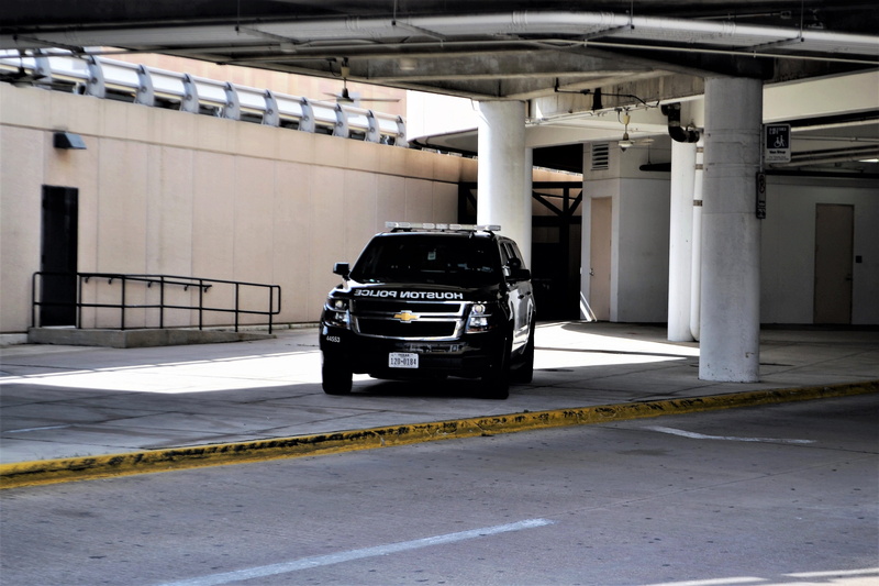 architectural column, suv, job, undercover, police, mode of transportation, arrest, city, land vehicle, hobby airport, parking garage, service, empty, texas police