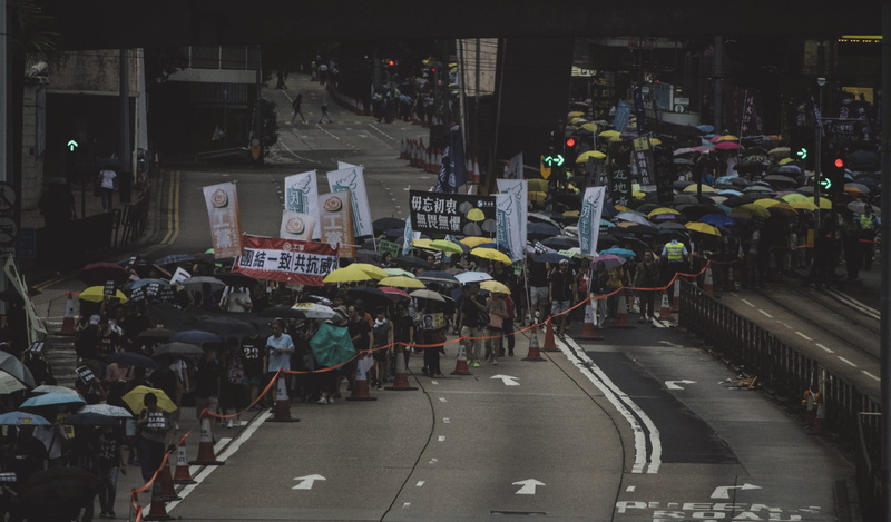 black, republic, hong kong, built structure, disappointed, group of people, city life, transportation, building exterior, real people, disappointments