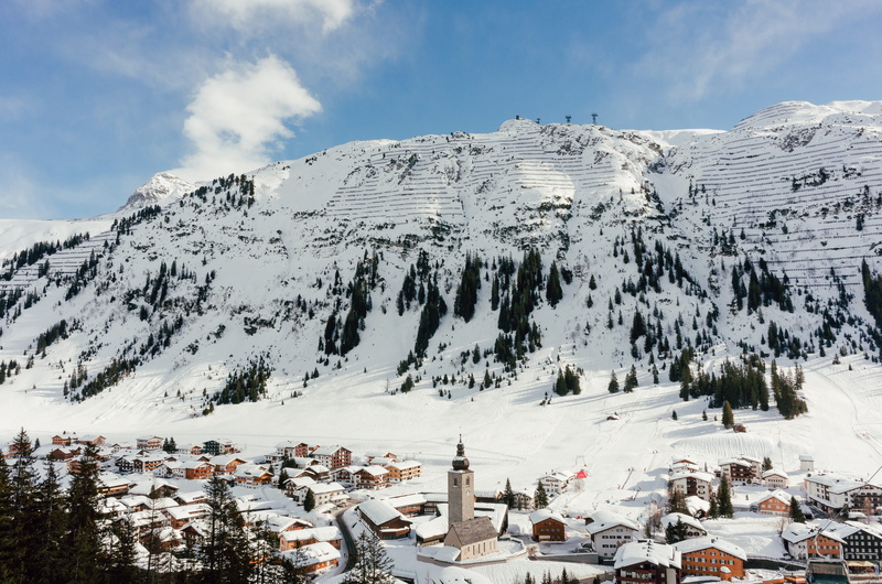 village, white, cold temperature, outdoors, tourism, sky, day, mountain, lech austria, scenery, skiing, mountains, winter season, building exterior, environment