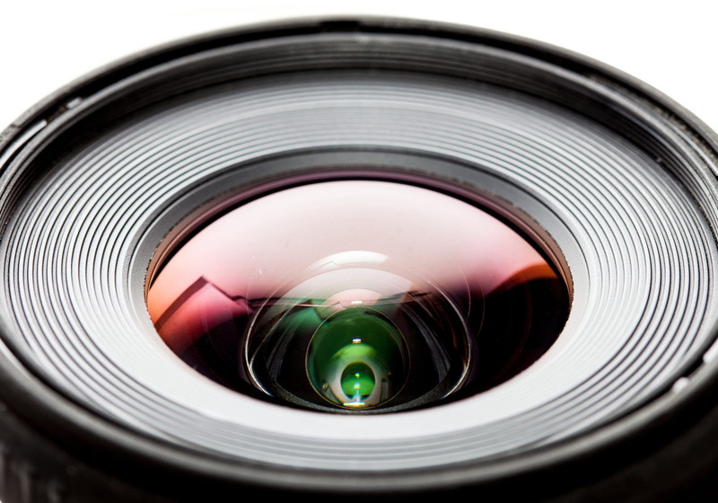 digital camera, glare, black, indoors, photographic Equipment, backgrounds, telephoto Lens, focus - Concept, black Color, glass - Material, single Object