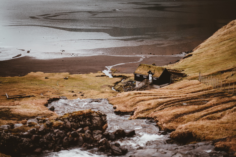 sea, house, beauty in nature, land, solid, turf roof, hillside, rugged, grass, bay, nordic, rock - object, home, highland, body, 8K, tranquility, flowing