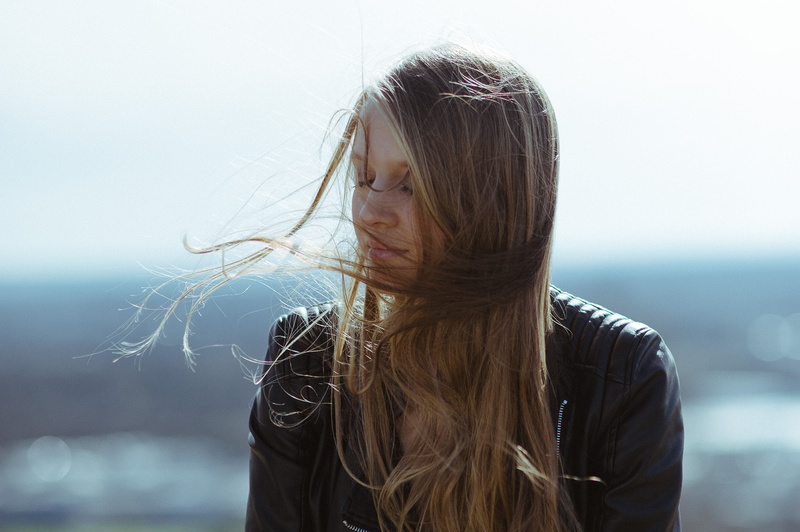 one person, long hair, young adult, adult, blonde, contemplation, lifestyles, closed eyes, headshot, brown hair, Timo Heß, women, leather jackets, real people