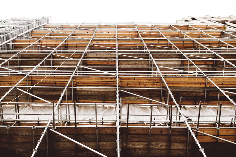 outdoors, building exterior, sky, low angle view, unfinished, day, no people, concrete, clear sky, built structure, site, nature, industry, building, pattern
