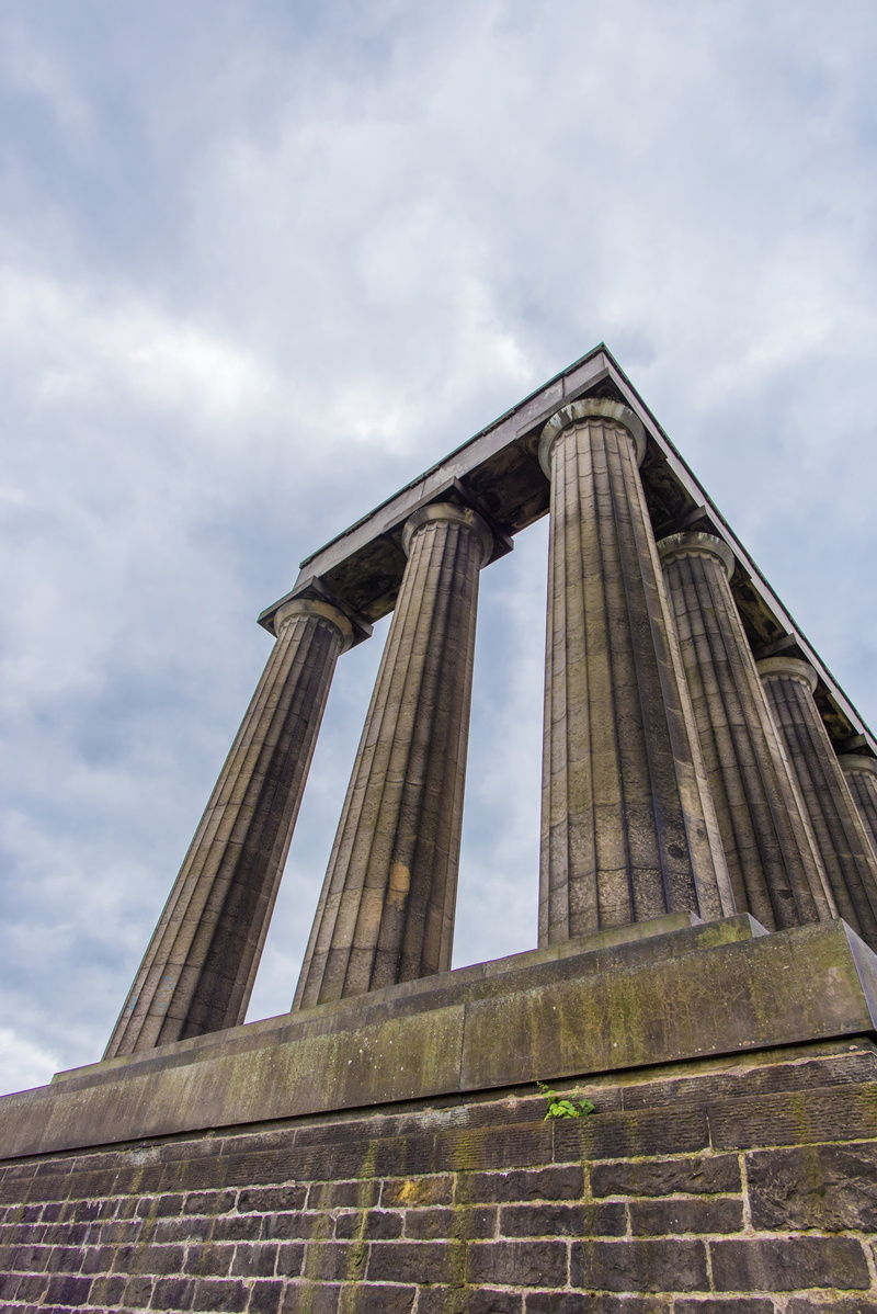history, pillar, tourism, clouds, hill, architectural column, low angle view, built structure, stone, national monument of scotland, ancient civilization