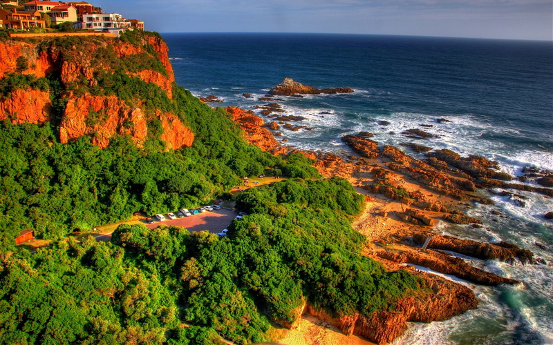 sea, beauty in nature, nature, high angle view, scenics - nature, beside, day, mountain, built structure, water, tree, horizon over water, architecture