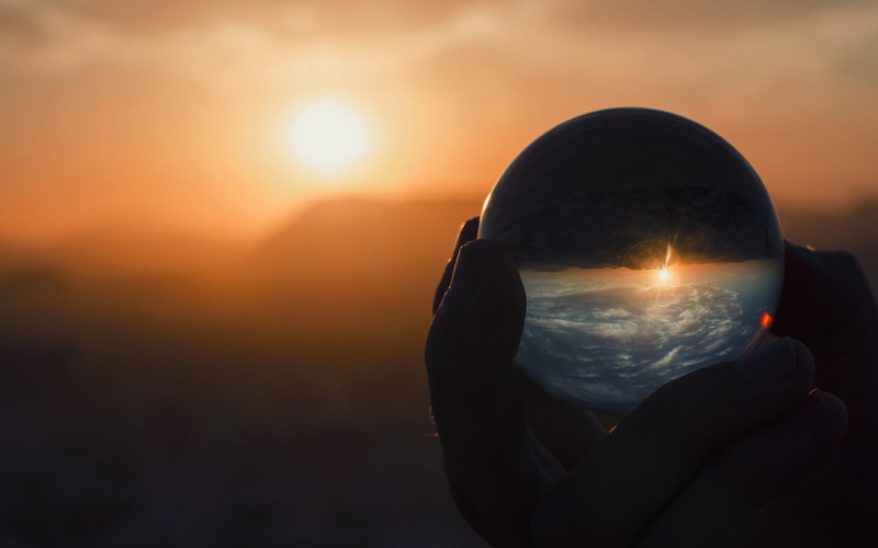 orange color, shirt, bright, scenics - nature, sphere, s, sky, reflection, sunlight, one person, leisure activity, neck, holding, obscured face, sunset
