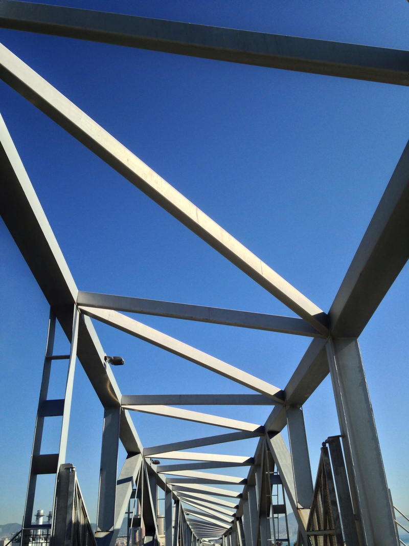 barcelona, bridge - man made structure, girder, outdoors, low angle view, blue, concept, architecture, building exterior, deep, sky, built structure, no people