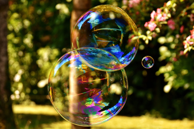 iridescent, bubble wand, nature, focus on foreground, sphere, transparent, wabbelig, day, colorful, fragility, shape, multi colored, make soap bubbles