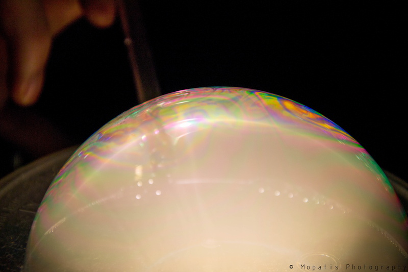 single object, vulnerability, no people, day, smoke, shiny, shape, focus on foreground, food and drink, multi colored, sphere, bubble, reflection, soap sud