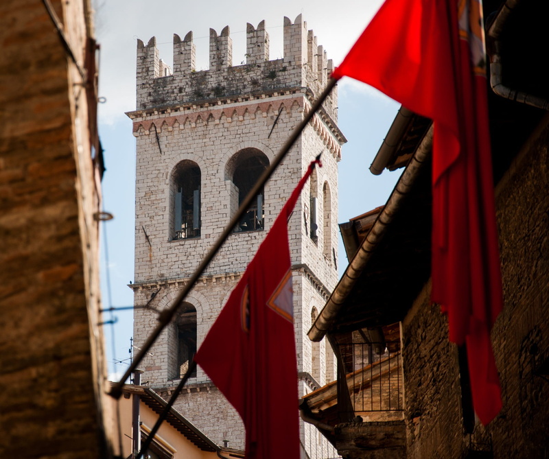 flags, built structure, the past, building exterior, sunlight, no people, day, old village, patriotism, low angle view, torre, building, nature, outdoors