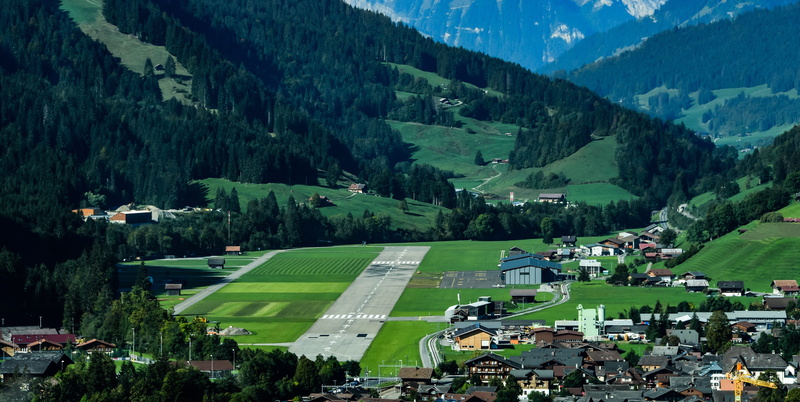 tree, aviation, building exterior, bern, beauty in nature, gstaad, incidental people, building, built structure, aerodrome, 5K, track, outdoors, plant