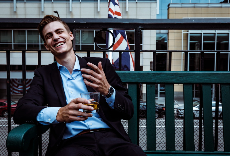 building Exterior, smiling, whisky, laughing, professional, communication, males, occupation, lifestyles, concrete, urban Scene, corporate Business, white Collar Worker