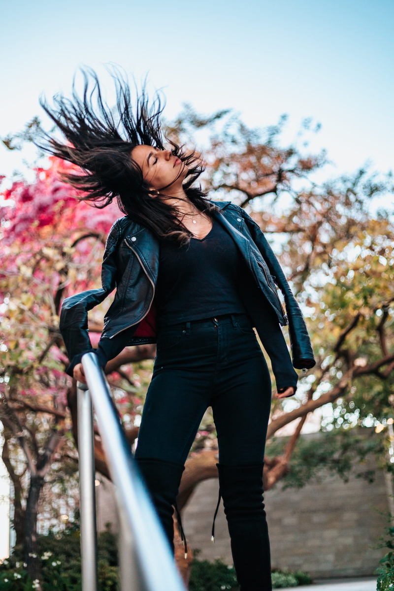 flipping, outdoors, blossom, leisure activity, hair, one person, young women, full length, low angle view, 5K, adult, young adult, lifestyles, portrait