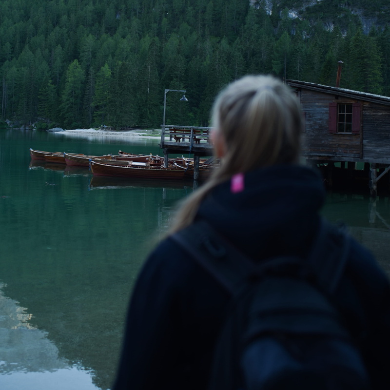 transportation, pier, port, adult, italy, lake, fir, real people, plant, one person, water, waterfront, beauty in nature, abies, rear view, woman, braies