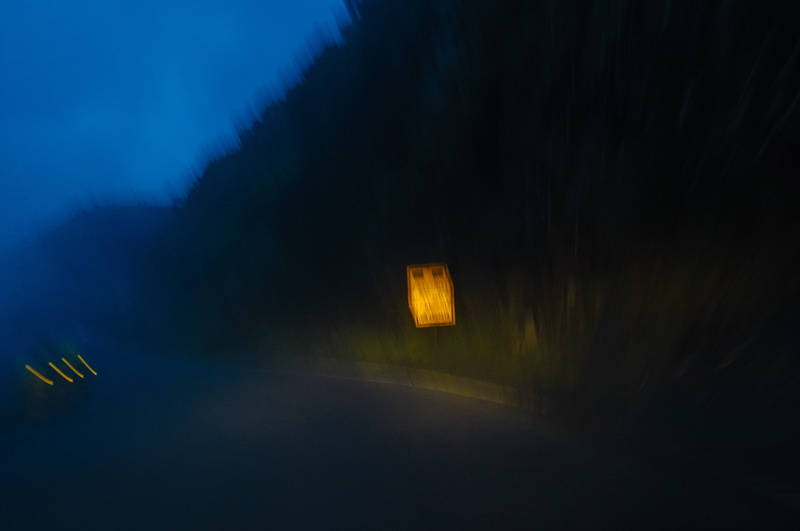 built structure, mystery, silhouette, highway, illuminated, suspense, night, carretera, electric lamp, yellow sign, flare, dark, nature, path, building