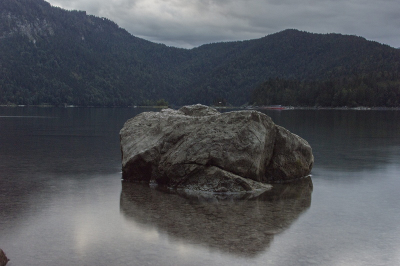 non-urban scene, no people, water reflection, scenics - nature, lake, boulders, rock - object, brine, mountain, cloud - sky, mood, tranquility, water surface
