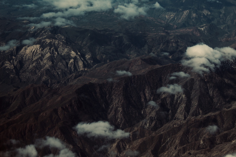 outdoors, imposing, cold temperature, range, tranquility, nature, smoke - physical structure, ridges, aerial, night, high angle view, environment, plant