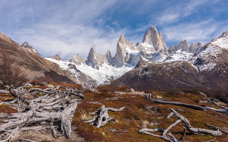 environment, rock, non-urban scene, outdoors, idyllic, clouds, tranquil scene, nature, day, mountain range, cloud - sky, tranquility, formation, snowcapped mountain