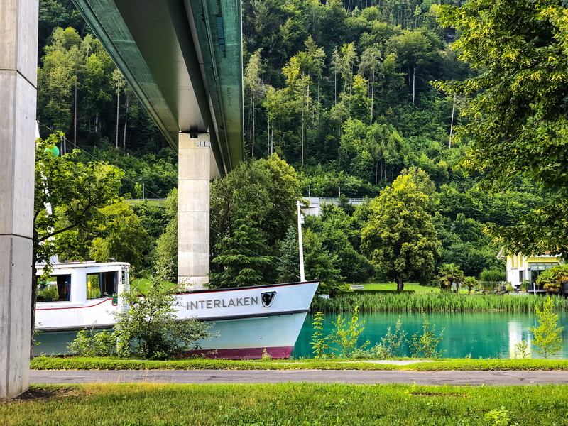 way, built structure, no people, canal, kammistrasse 5, mode of transportation, day, road, architecture, 4K, lake, outdoors, tree, vegetation, interlaken