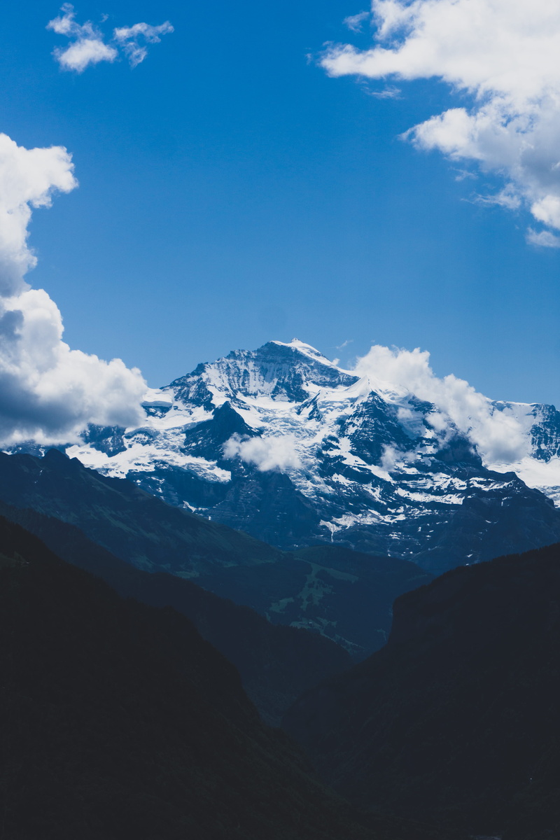 interlaken, no people, landscape, wanderlust, covered, tranquil scene, peak, cloud - sky, idyllic, adventure, mountain range, mountain ridge, ice, white
