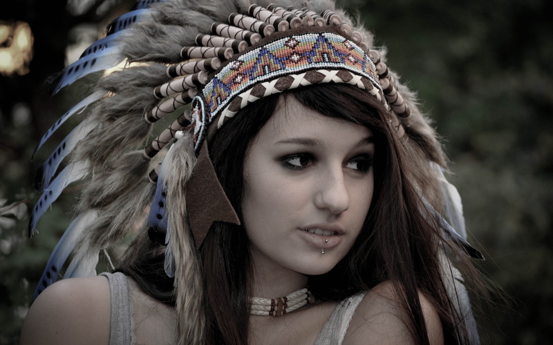 feathers, close-up, young women, women, long hair, clothing, headshot, contemplation, one person, beautiful woman, brown hair, front view, headdress, piercing