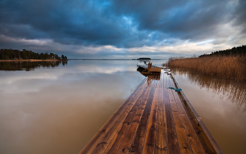 beauty in nature, lake, cloud - sky, wood - material, tranquil scene, reflection, idyllic, nautical vessel, pier, jetty, water, landscape, outdoors, scenics - nature