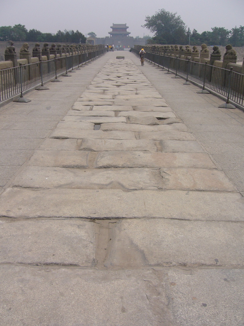 architecture, in a row, footpath, no people, surface level, day, built structure, vanishing point, direction, china, 2K, tree, pattern, nature, outdoors